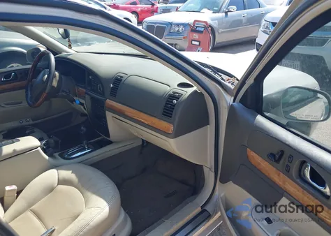 2000 Lincoln Continental из США, поврежденный, VIN 1LNHM97V8YY763843